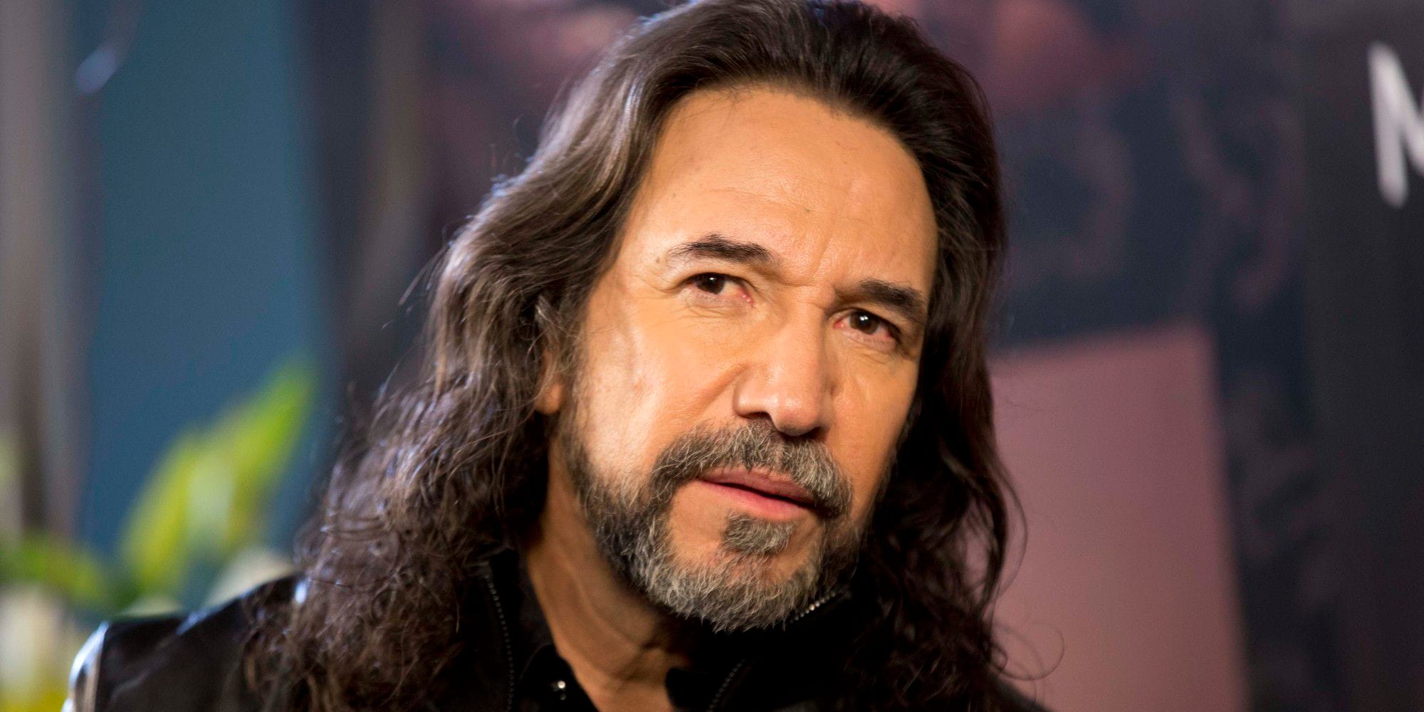 cuanto mide marco antonio solis
