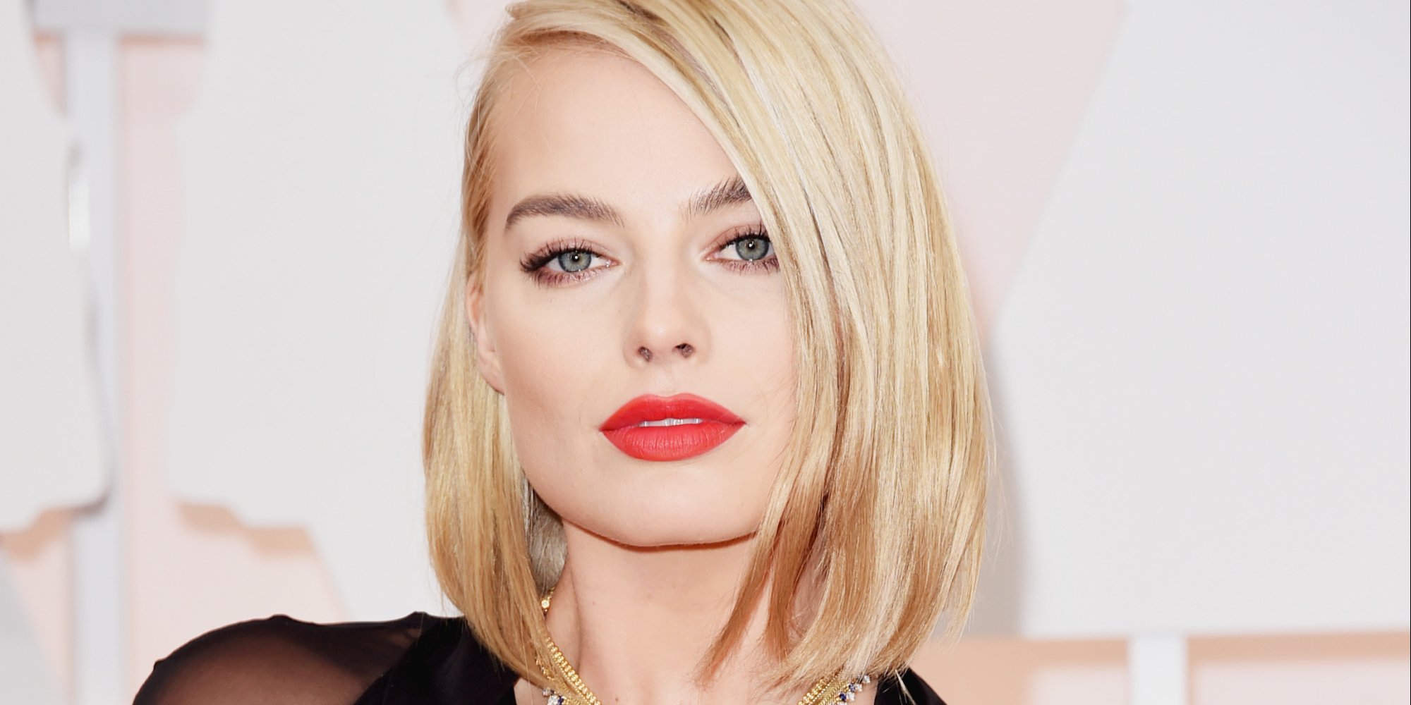 cuanto mide margot robbie